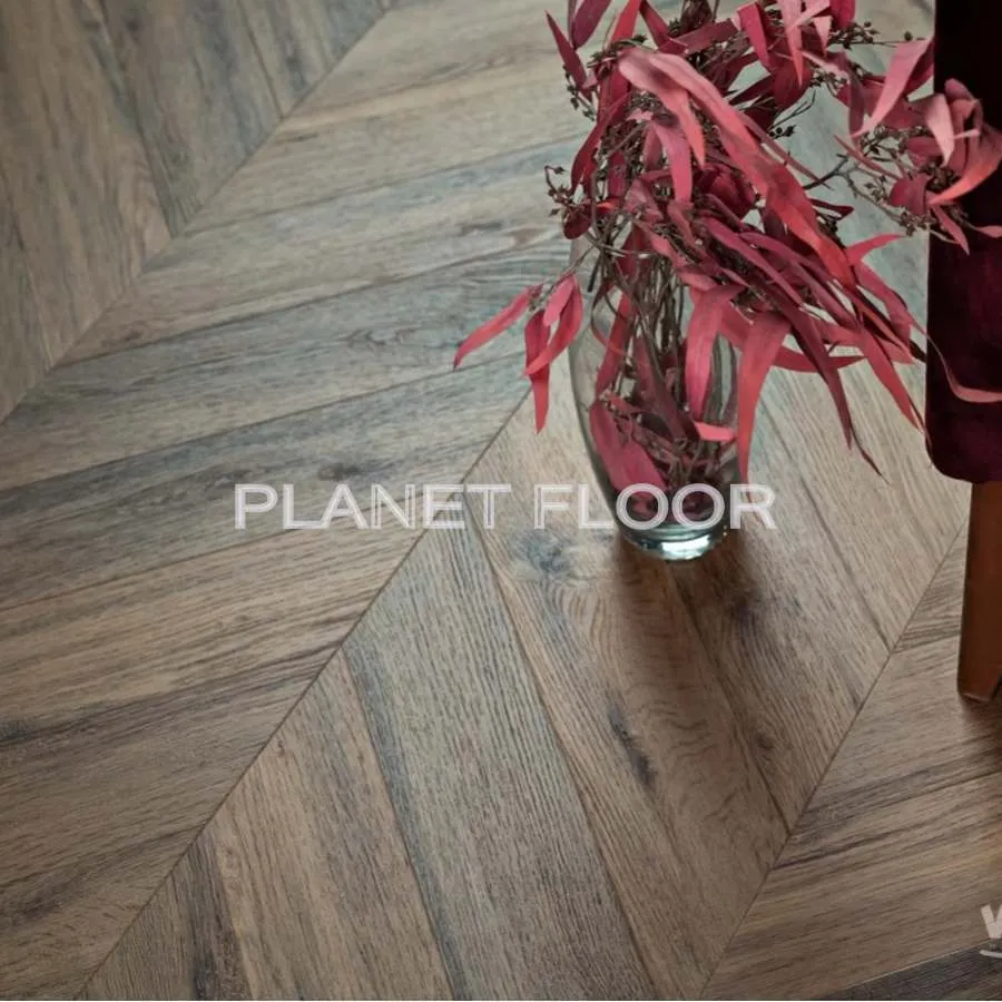 Виниловый ламинат Vinilam Parquet Chevron Glue RI107516 Шеврон Лувр Glue