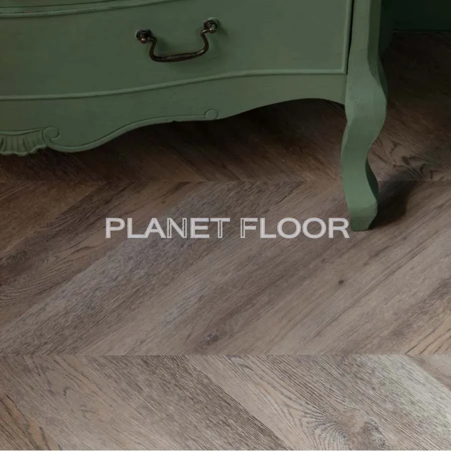 Виниловый ламинат Vinilam Parquet Chevron RI153616CL4 Шеврон Шампань